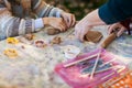 Children make clay figures by pottery