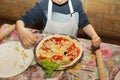 Children make pizza. Master class for children on cooking Italia