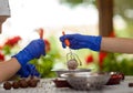 Children make simple figures from chocolate at a master class