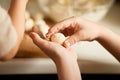 Children making a cottage cheese balls Russian syrniki in the home kitchen