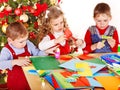 Children making decoration for Christmas.