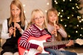 Children making music for Christmas Royalty Free Stock Photo