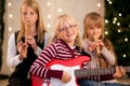 Children making music for Christmas Royalty Free Stock Photo