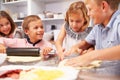 Children making pizza together Royalty Free Stock Photo