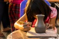 Children are making pottery before go to oven