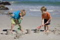 Children making sand castles Royalty Free Stock Photo