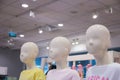 Children mannequins with modern clothes in fashion store display window Royalty Free Stock Photo