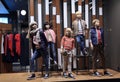 Children mannequins in warm clothes in the shop windowow. Sale Royalty Free Stock Photo