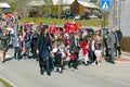 Children during the march in colorful Norwegian costumes
