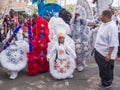 Children in Mardi Gras Indian costumes preparing for Super Sunday parade