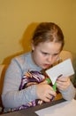 Children at a master class on making Christmas cards. Royalty Free Stock Photo