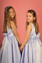 Children model. Fashion kids have fun relaxing in studio