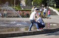 Children near a splashing fontain in the center of town 12 June 2016 Pyatigorsk, Russia, Town Square