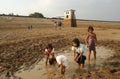 Children near the storage reservoir Dawuhan, Wonoasri, Madiun