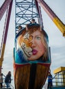 Children on a non-working carousel. Children\'s pranks. They occupied the carousel. Luna park.