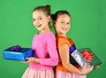 Children open gifts for Christmas. Girls with smiling faces Royalty Free Stock Photo