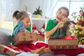 Children opening Christmas presents Royalty Free Stock Photo