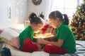 Children opening Christmas presents Royalty Free Stock Photo