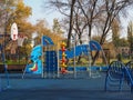 Children outdoor playground in a new residential area. Nobody. Comfortable safe urban environment. City living. Stay at home