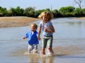 Children paddling in river Royalty Free Stock Photo