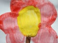 Children painted flower on white paper