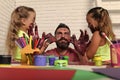 Children painted the parent. Fathers day and family concept