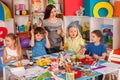 Children painting and drawing together. Craft lesson in primary school. Royalty Free Stock Photo