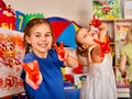 Children painting finger on easel. Small students in art school class. Royalty Free Stock Photo