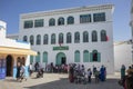 Children and parents in front of the school in the medina of Asilah