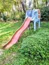 Children park with artificial elephant.