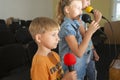 Children participate with a microphone, recite poems, recitation, sing songs