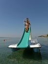 Children on pedal boat at sea 1