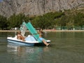 Children on pedal boat at sea 3