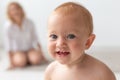 Children, people, infancy and age concept - beautiful happy baby at home Royalty Free Stock Photo