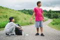 Children picking up empty of bottle plastic into bin bag Royalty Free Stock Photo