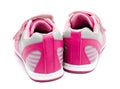 Children pink sport shoes isolated