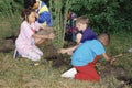 Children planting trees Royalty Free Stock Photo