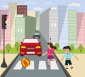Children play ball on the roadway.