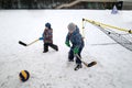 Children play bandy Royalty Free Stock Photo