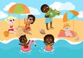 Children play on the beach, girls build a sand castle and sit under a sun umbrella. The boy inflates an inflatable ring. Royalty Free Stock Photo