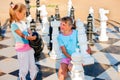 Children play chess outdoor Royalty Free Stock Photo