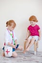 Children play doctor and patient Royalty Free Stock Photo