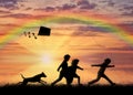 Children play with dog and kite sunset Royalty Free Stock Photo