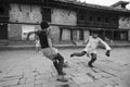 Children play football after lesson at Jagadguru School. Royalty Free Stock Photo