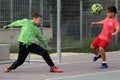 Children play football in the schoolyard