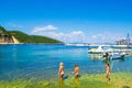 Children play in Frikes beach Ithaca island bay Greece Royalty Free Stock Photo