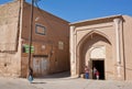 Children play in the historical area of iranian desert town.