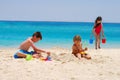 Children play at island beach
