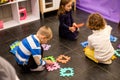 Children play together at the day care