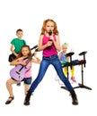 Children play musical instruments as rock group Royalty Free Stock Photo